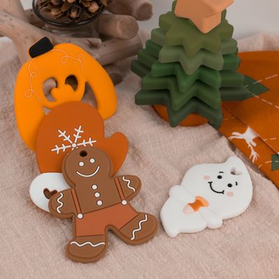 ยางกัดซิลิโคนแบบกำหนดเองสีสันสดใสยางกัด Gingerbread Man เป็นมิตรกับสิ่งแวดล้อมสำหรับเด็ก