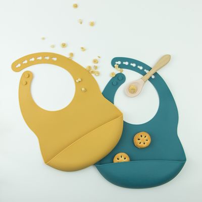 เด็กวัยหัดเดินให้อาหารซิลิโคน Baby Bib ปลอดสารบีพีเอ Soft พร้อมที่จับอาหาร