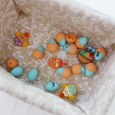 สีซิลิโคนข้อมือฟันด้วยการออกแบบการพิมพ์ตามสั่ง สีซิลิโคนไข่อีสเตอร์ 3 มิติที่มีเปลือกเปลือก