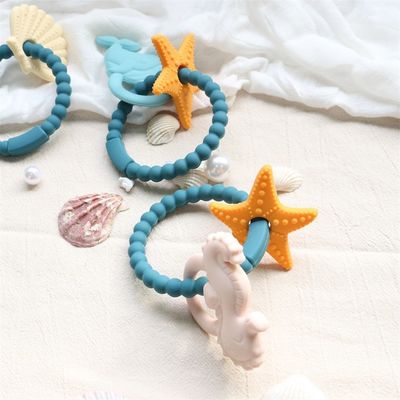 ฟู้ดเกรดซิลิโคนเด็ก Teether ด้วยการออกแบบไม่เป็นพิษและการจับมือง่าย BPA ฟรีซิลิโคนฟันแหวน