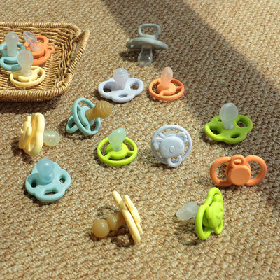 Custom Cute การ์ตูนรูปร่างซิลิโคน นมลูกฟรี BPA เด็กฟันและผ่อนคลายเด็กนมลูก
